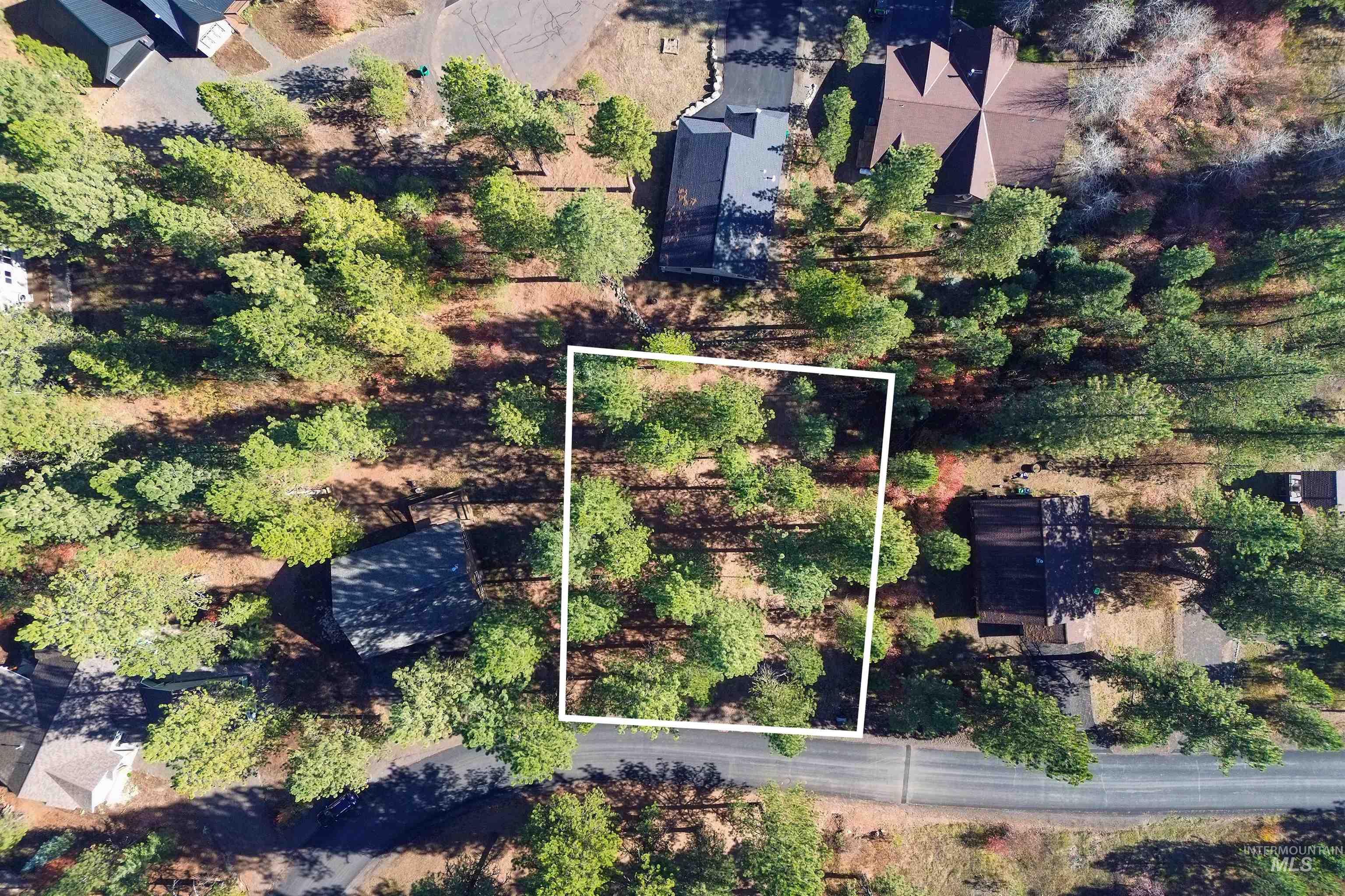 Aerial overview of property's location featuring property boundaries highlighted
