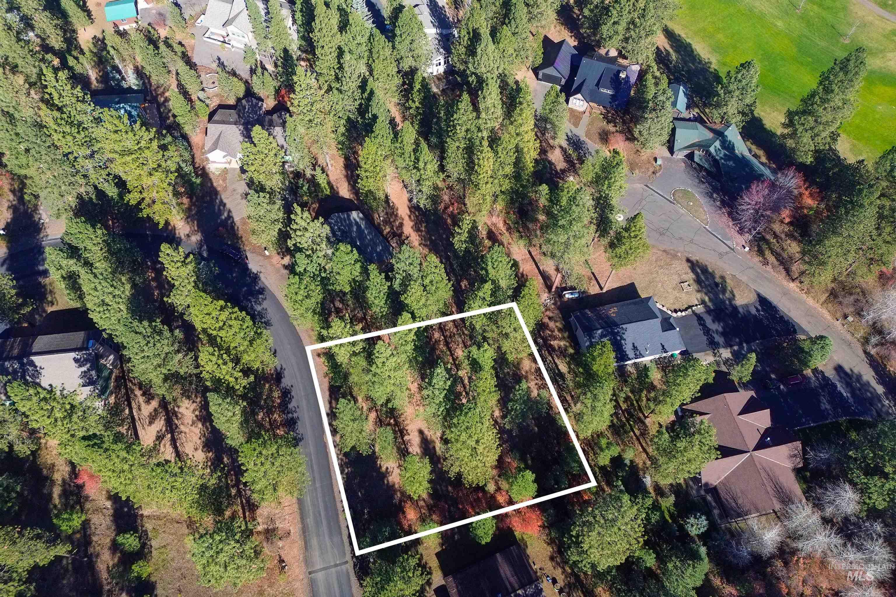 Aerial view of property's location with property parcel outlined