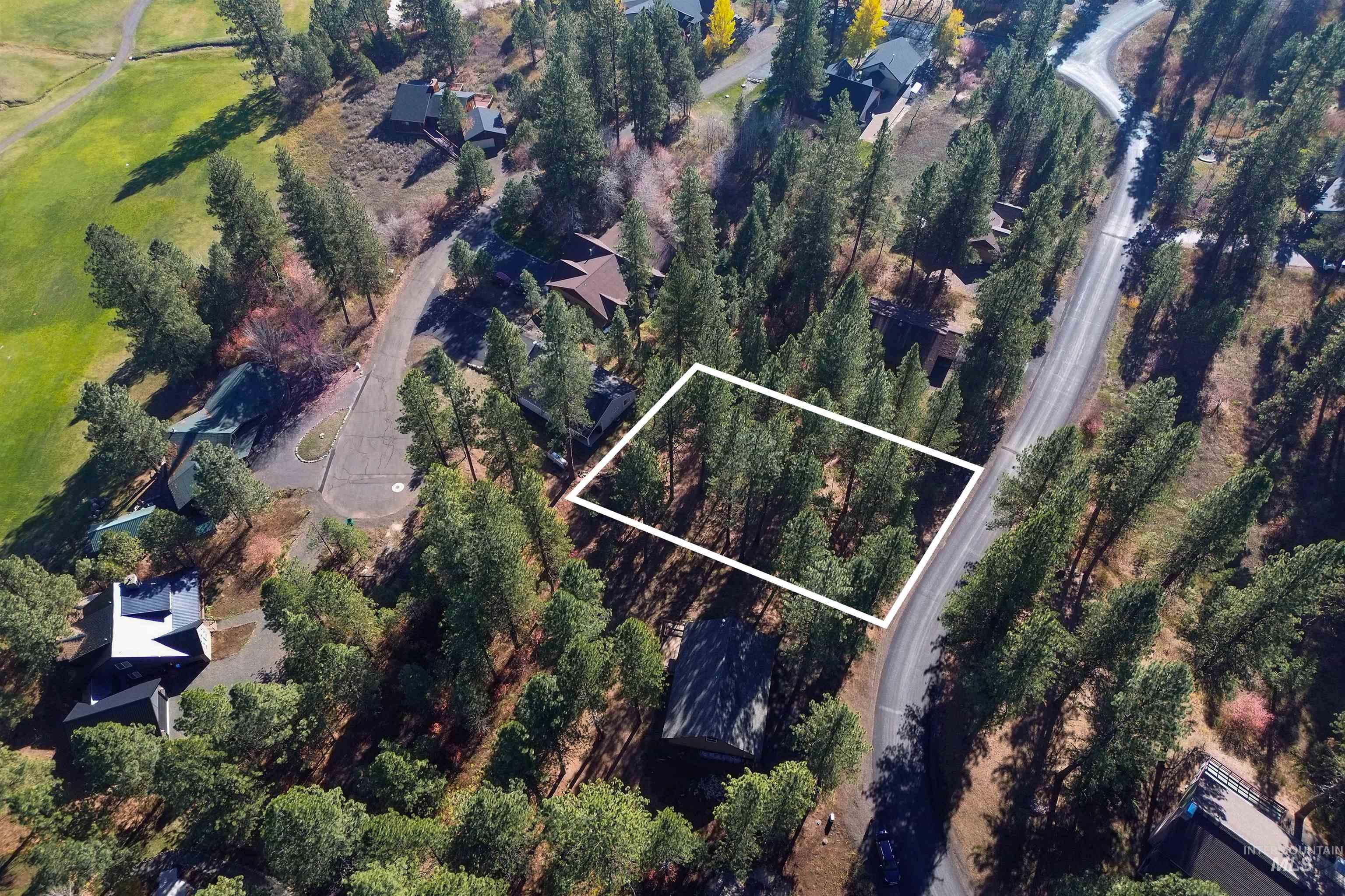 Aerial overview of property's location featuring property parcel outlined