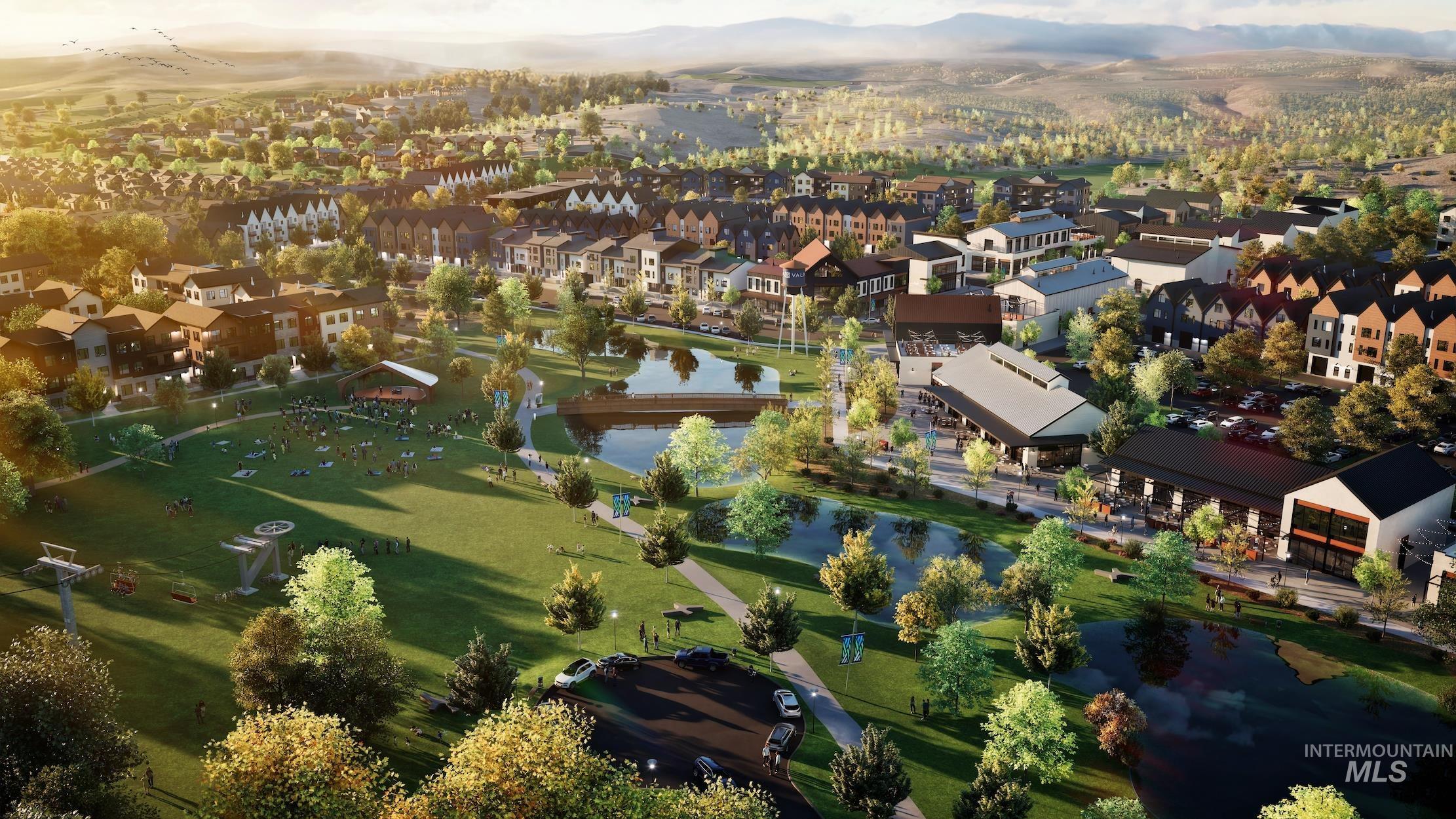 Aerial perspective of suburban area featuring a water and mountain view