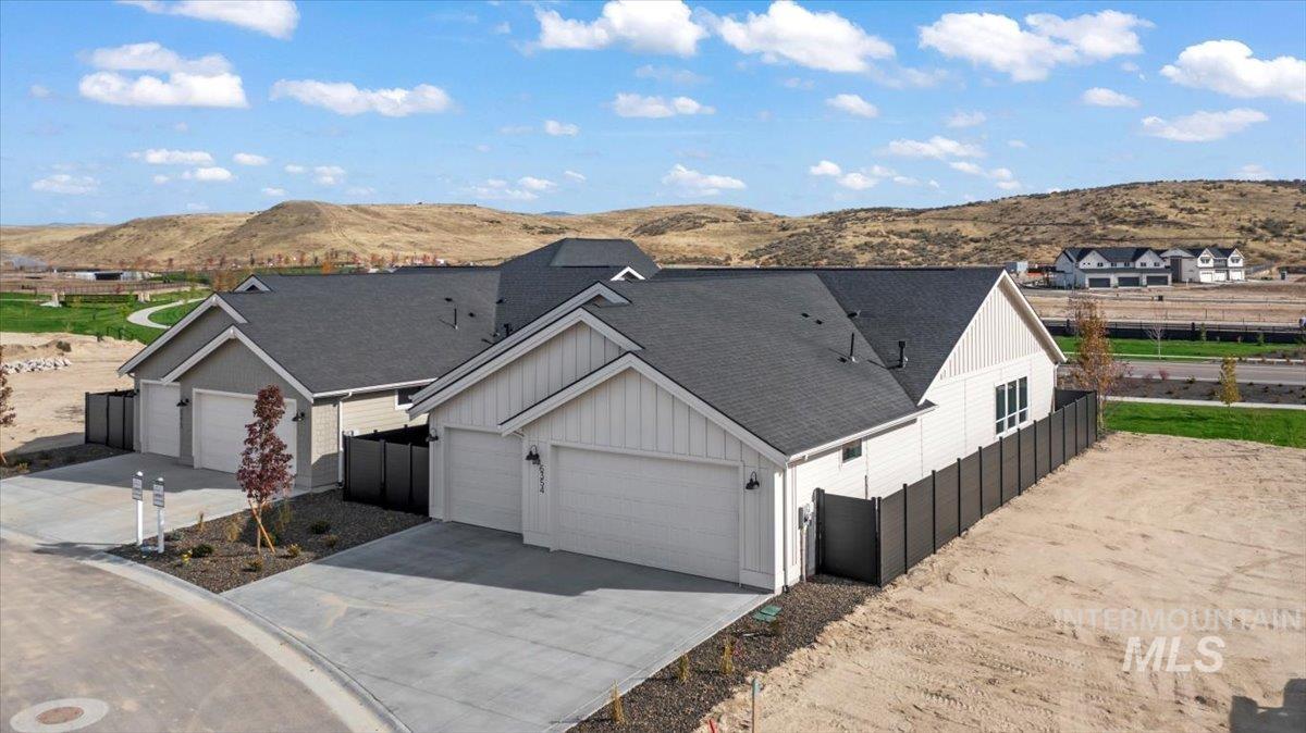 View from above of property with a mountainous background