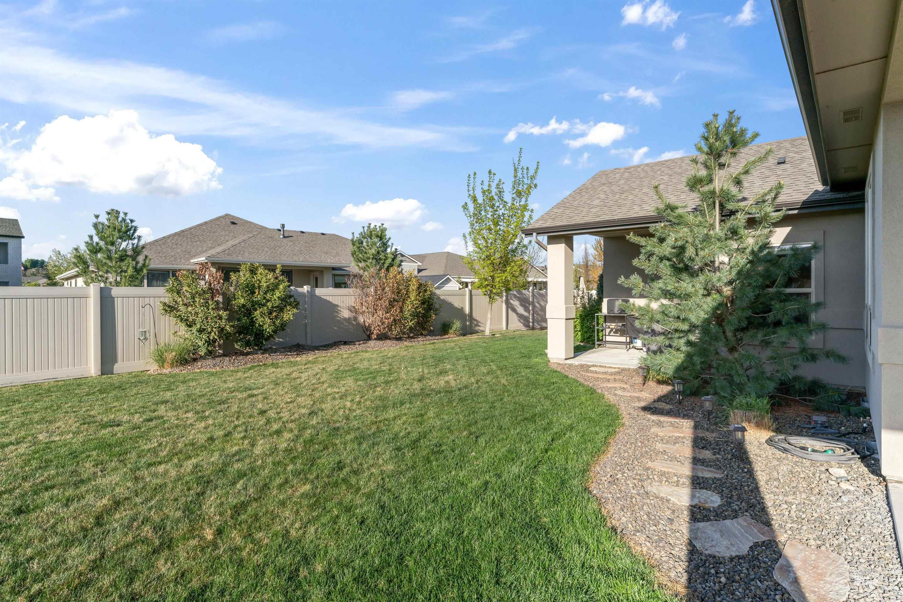 Fenced yard with a patio