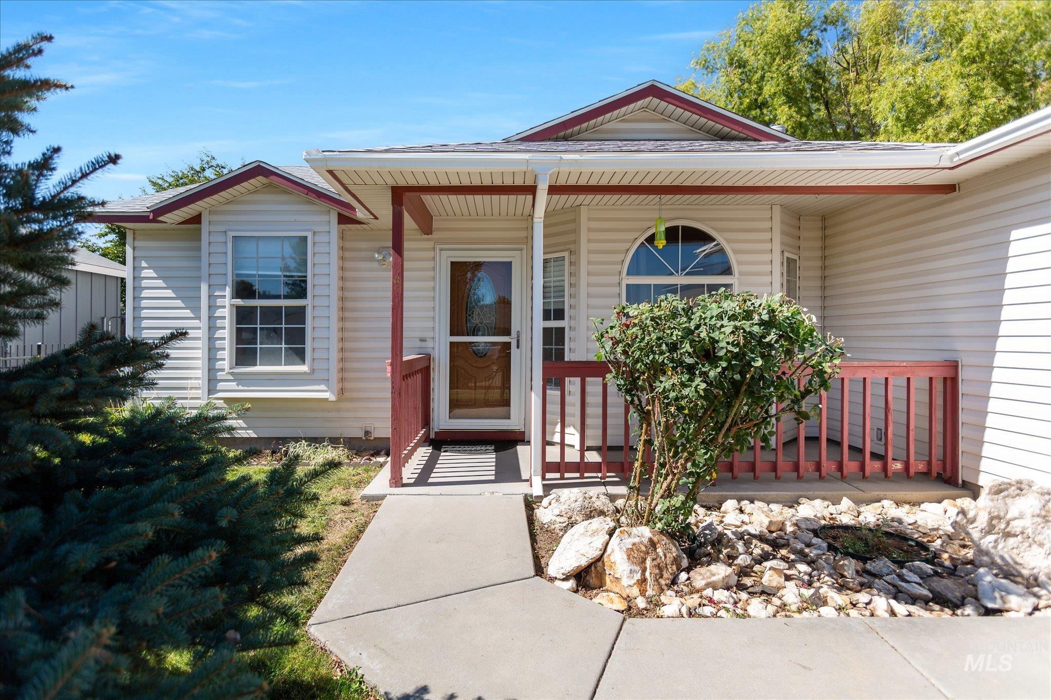 Entrance to property with covered porch
