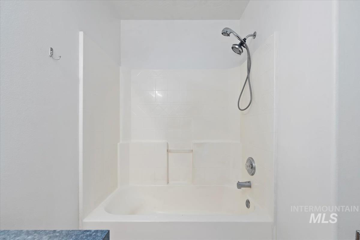 Bathroom featuring shower / tub combination