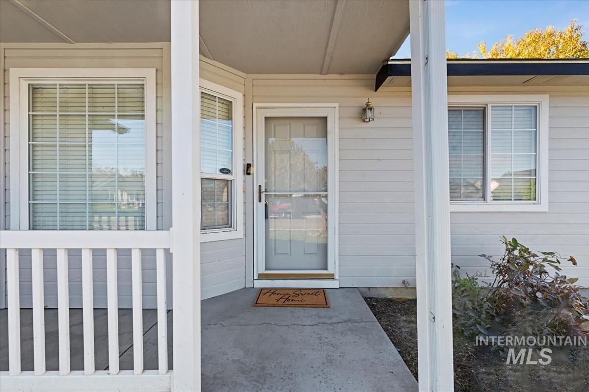 Doorway to property with a porch