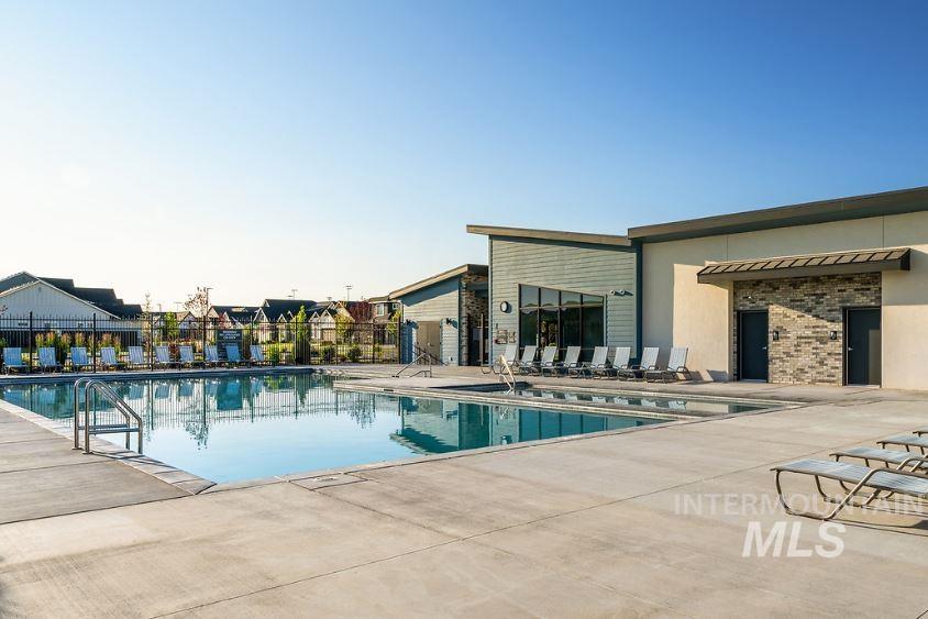 Community pool with a patio area