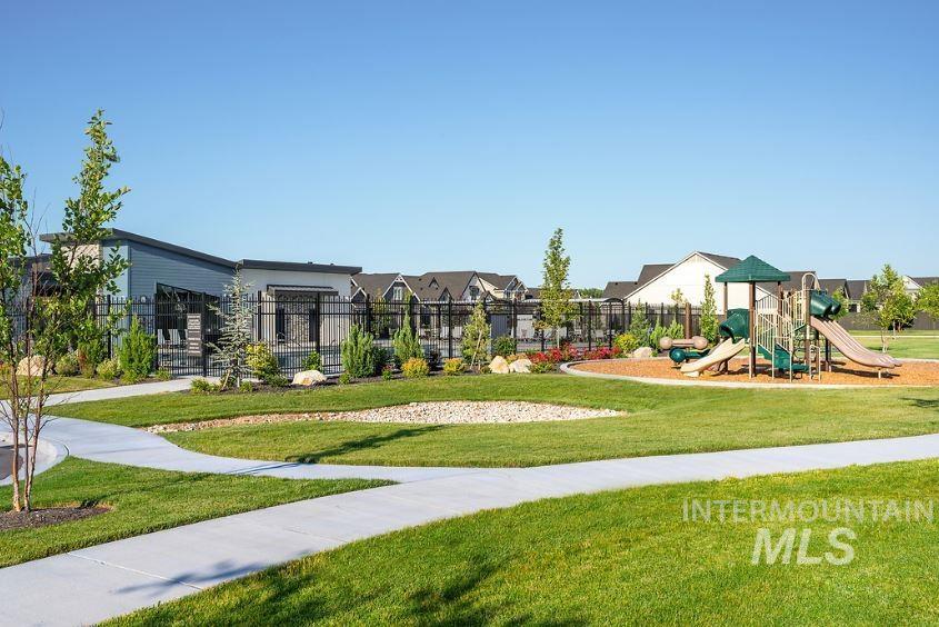 Community playground with a residential view