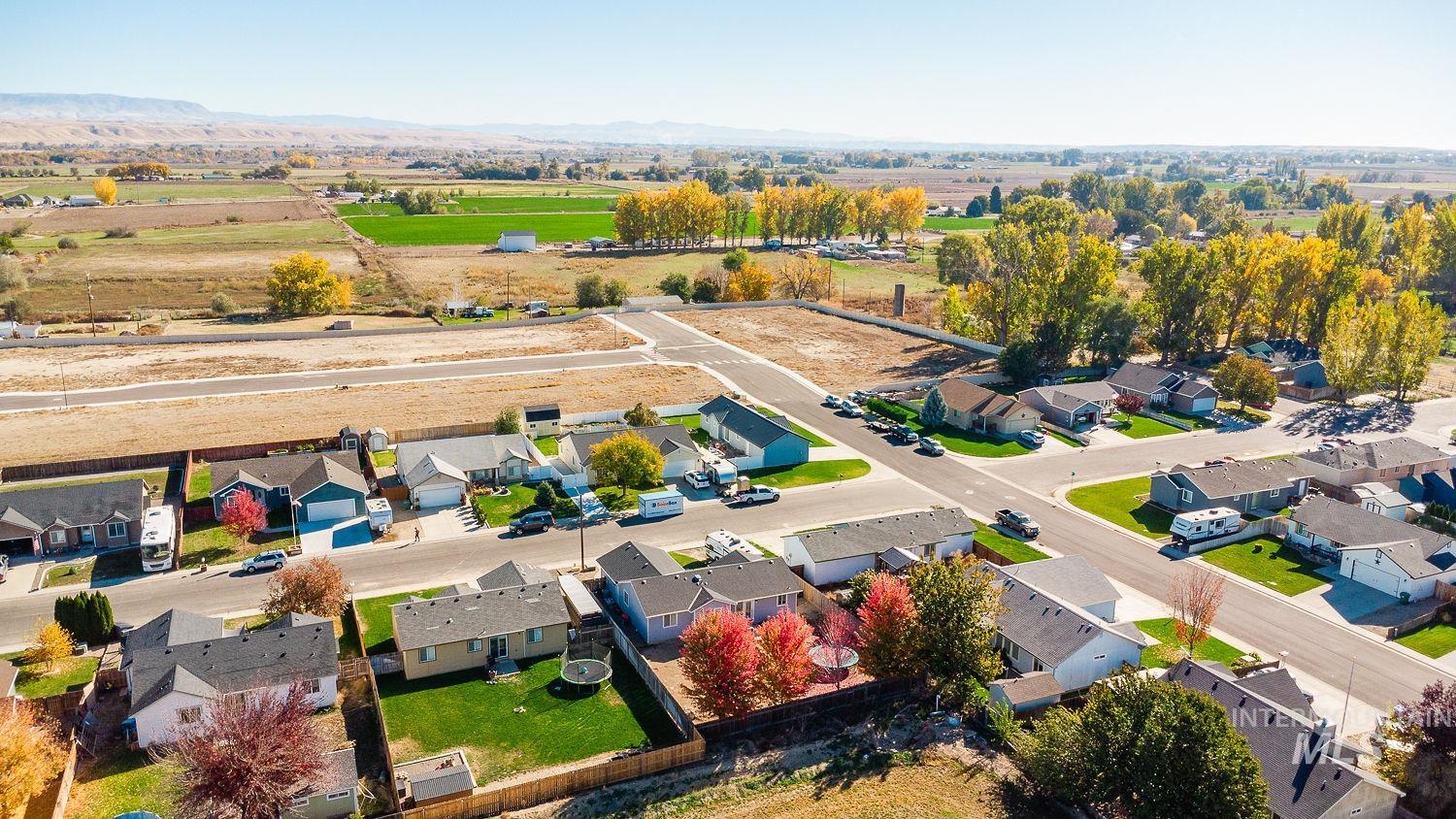 Aerial view of residential area with a mountainous background