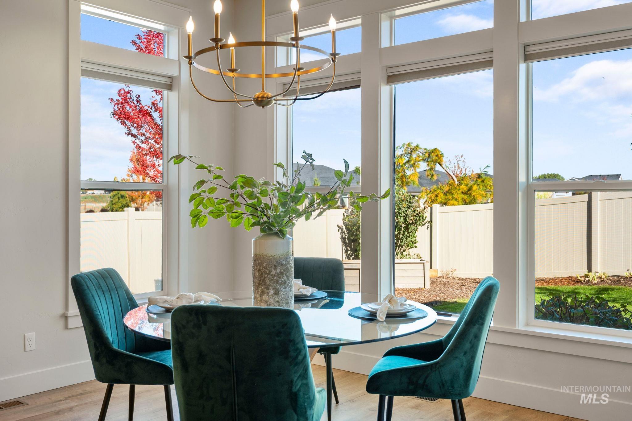 Dining room featuring a chandelier and wood finished floors