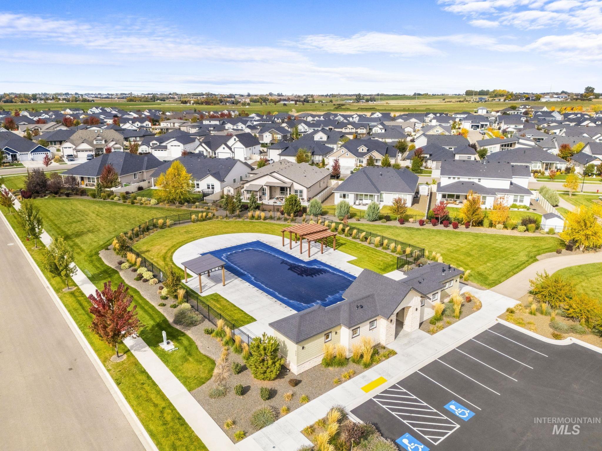 Aerial view of residential area with a pool area