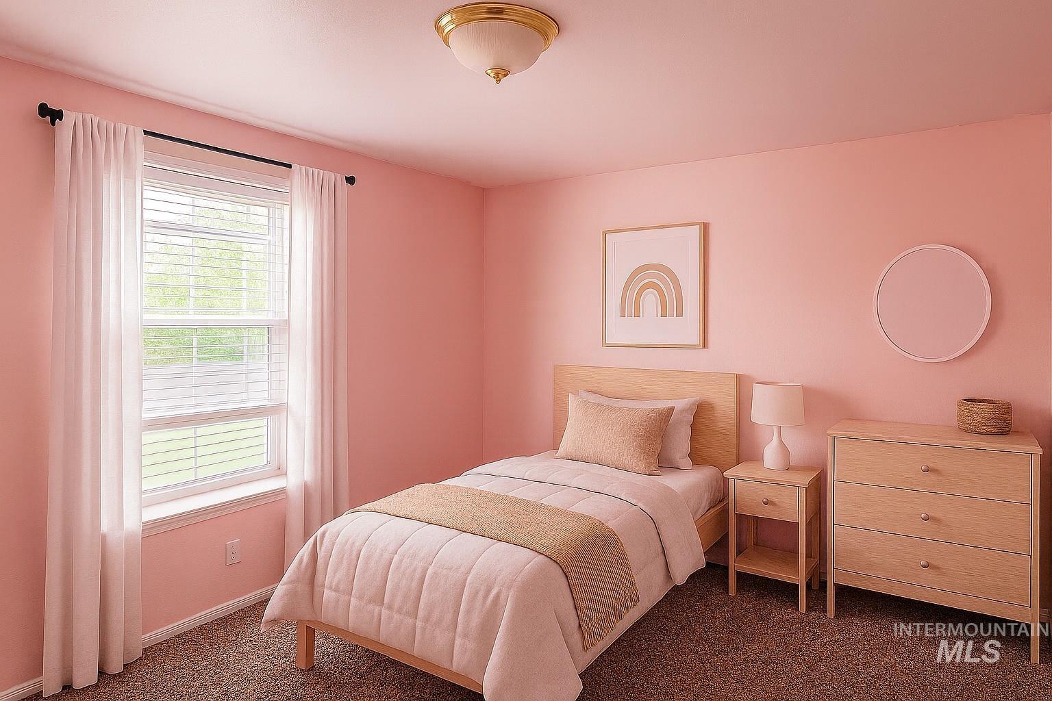 Carpeted bedroom featuring baseboards