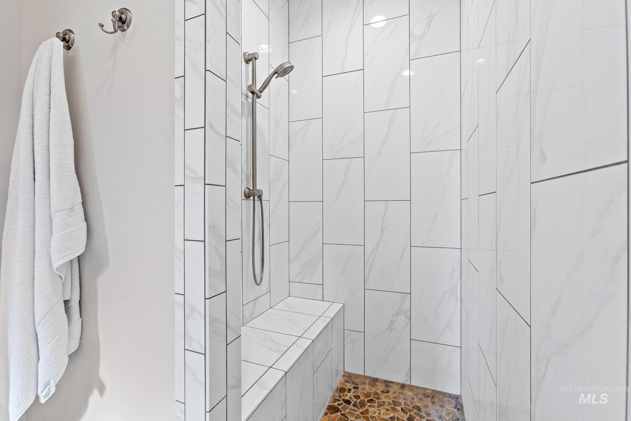 Bathroom with a tile shower