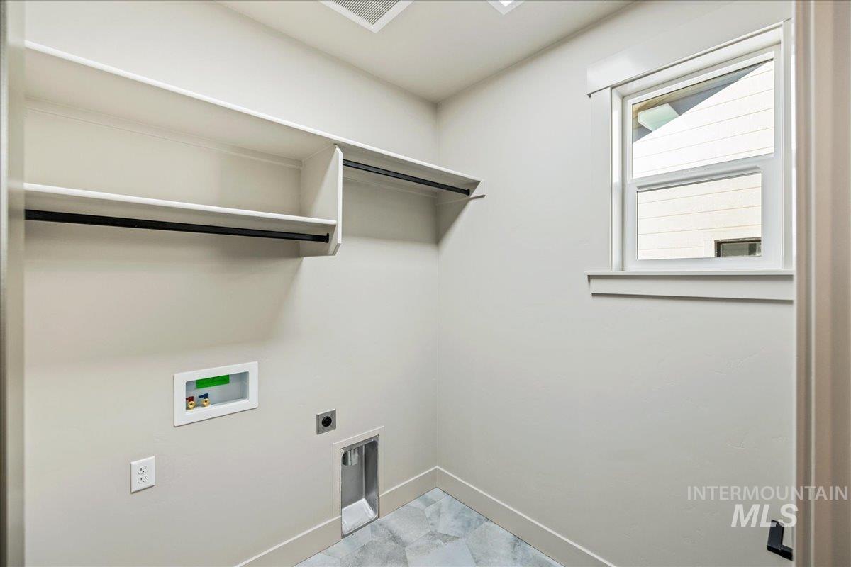 Laundry room featuring hookup for an electric dryer and washer hookup