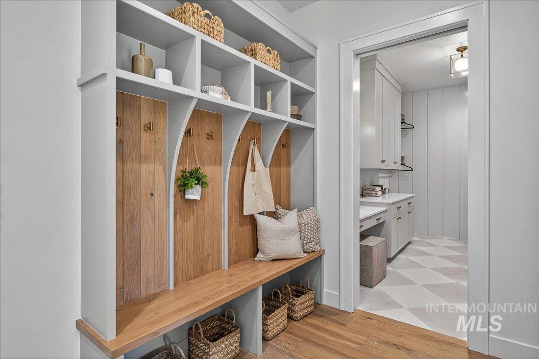 Mudroom with light wood-style floors