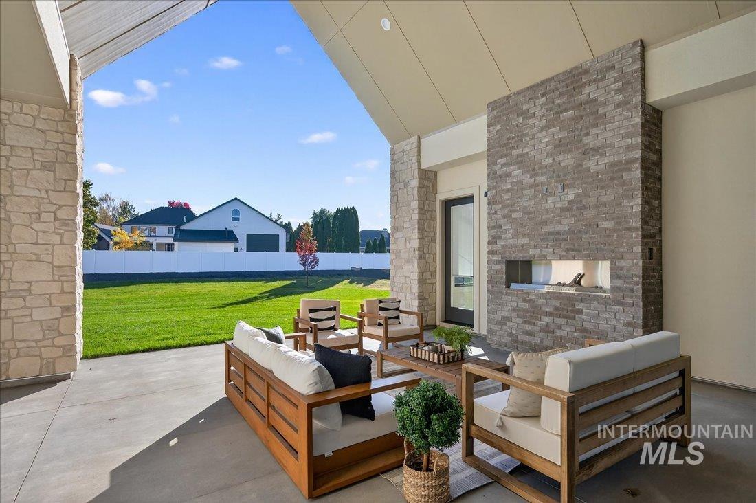 View of patio featuring an outdoor hangout area