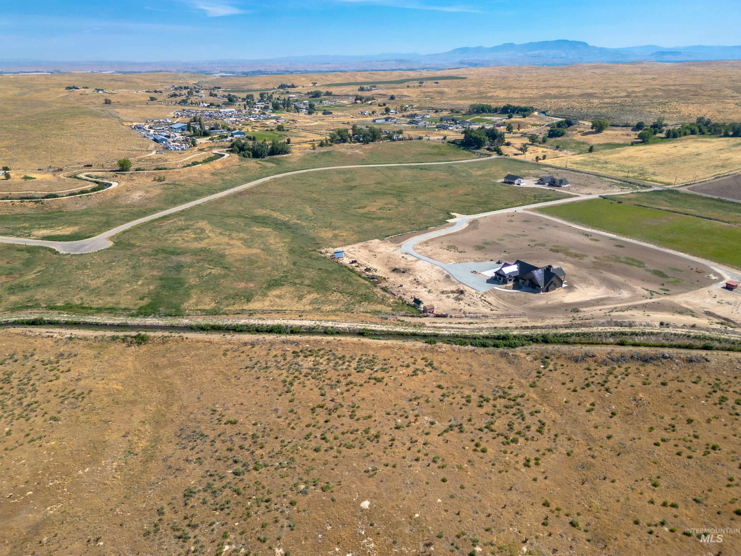 Aerial view of property's location with rural landscape