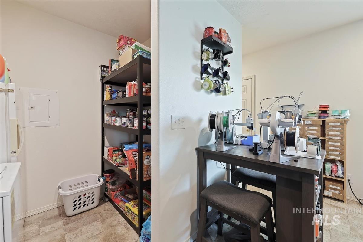 Storage area with electric panel and washer / clothes dryer