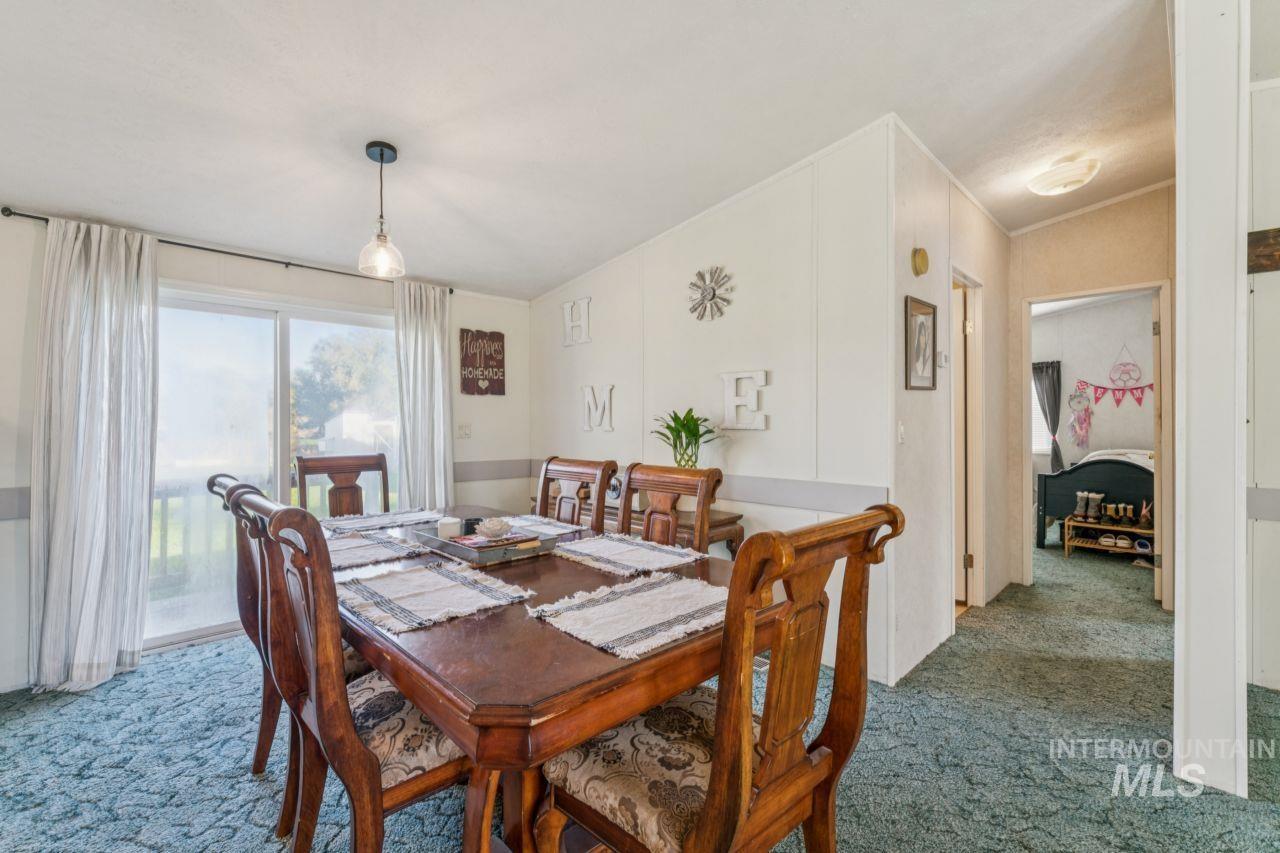 Dining space featuring carpet