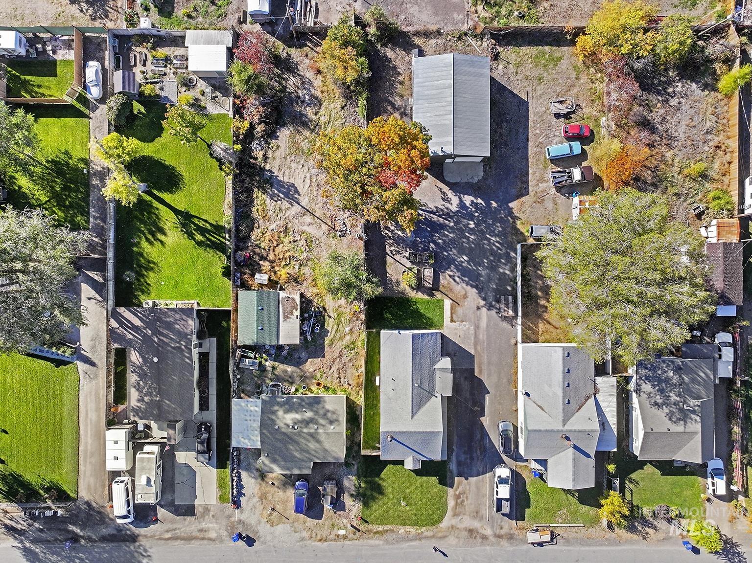 Aerial overview of property's location featuring nearby suburban area