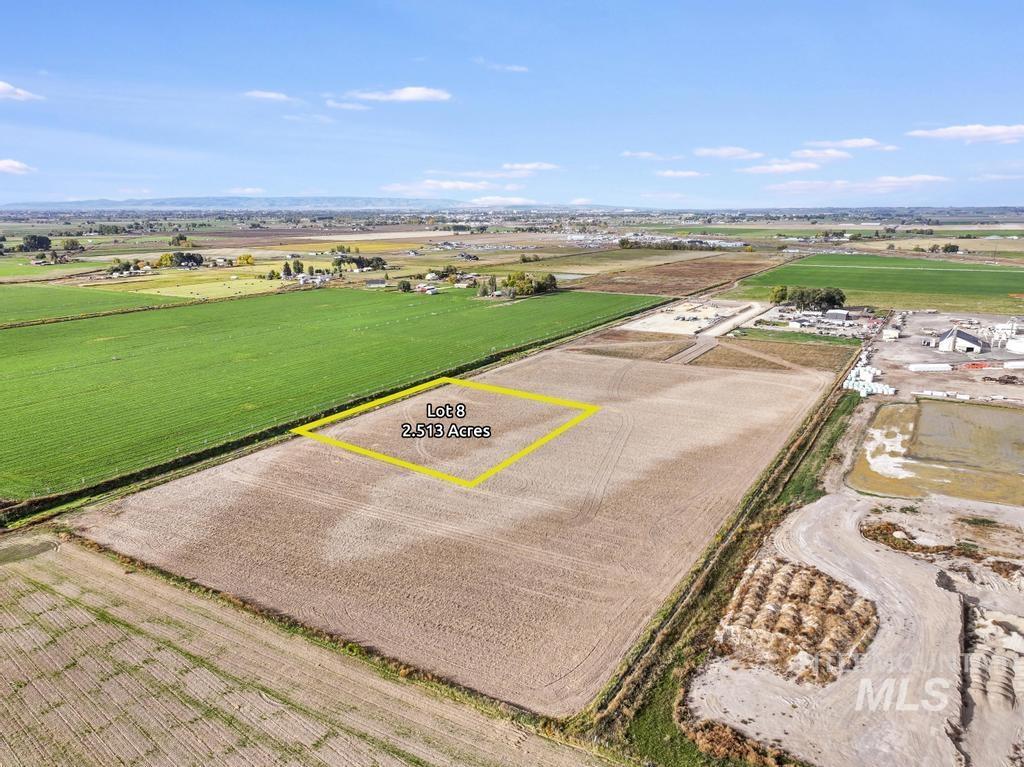 Overview of rural landscape featuring farmland and property boundaries highlighted