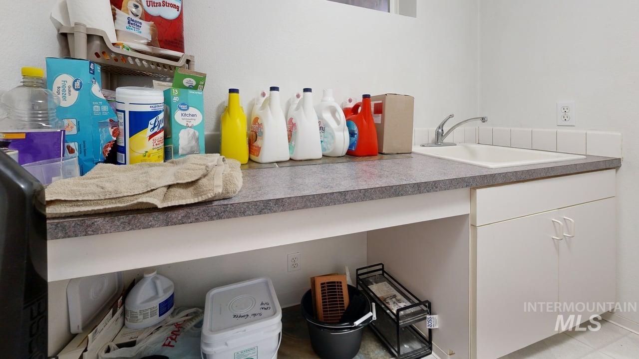 Laundry room featuring a sink
