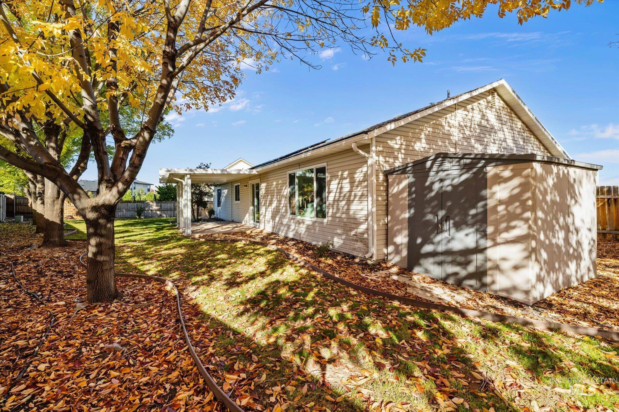 View of side of home featuring a patio