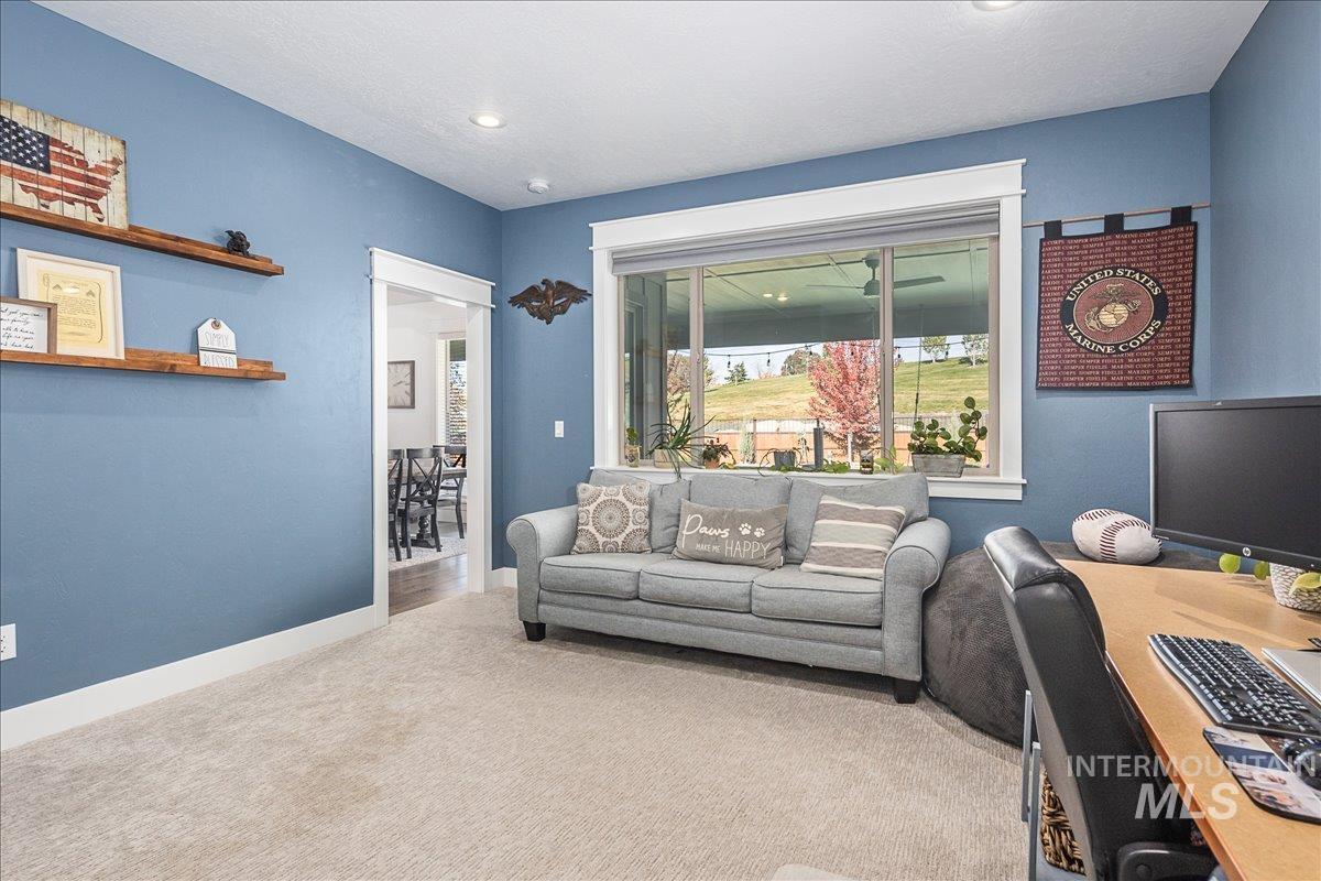 Office space featuring carpet and recessed lighting
