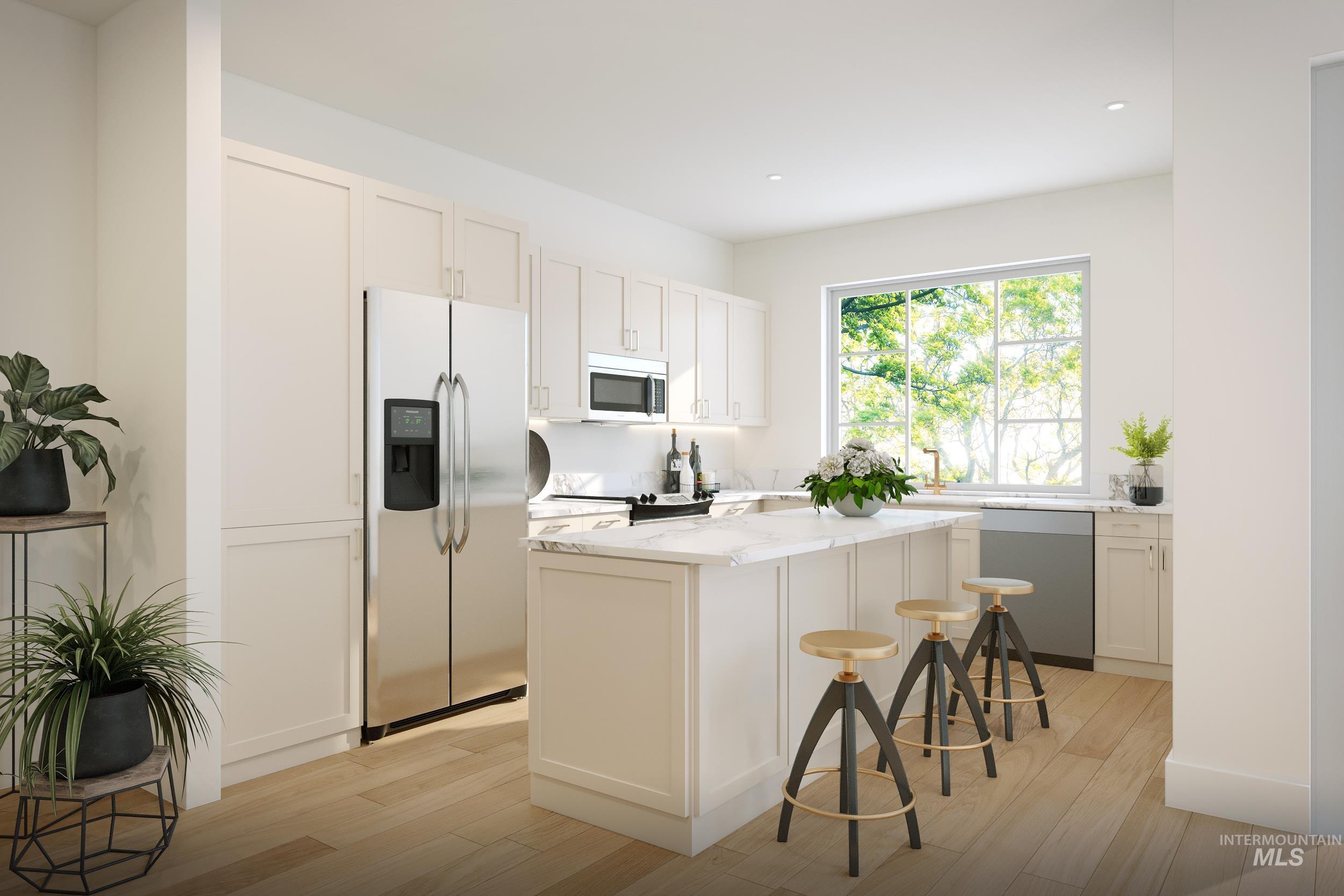 Kitchen with stainless steel appliances, light wood-style flooring, a kitchen island, white cabinetry, and recessed lighting