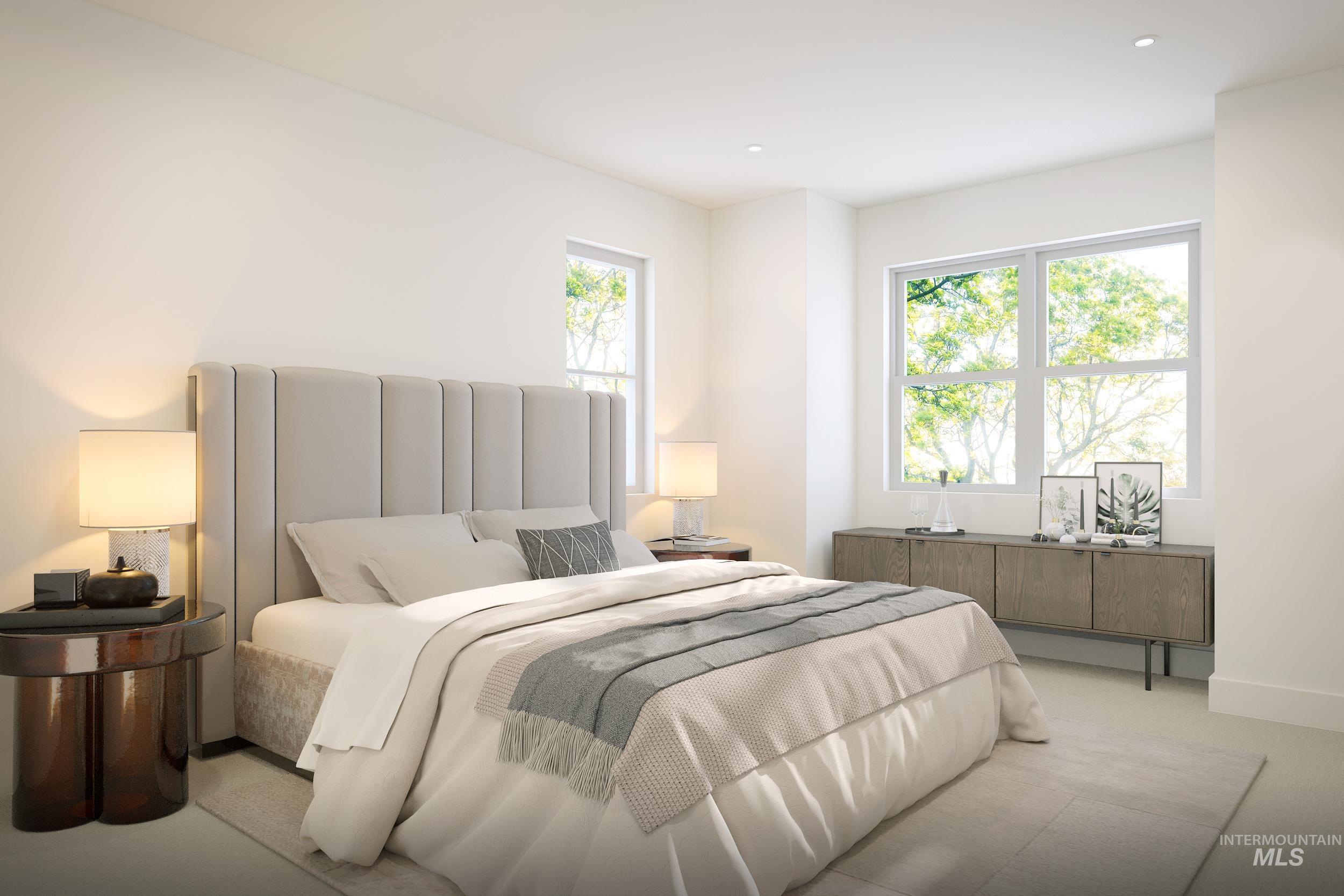 Carpeted bedroom featuring baseboards