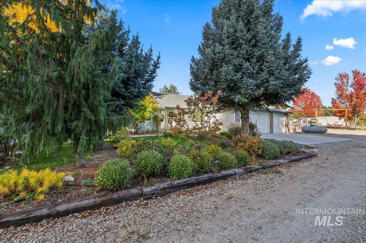 View of front of home featuring driveway