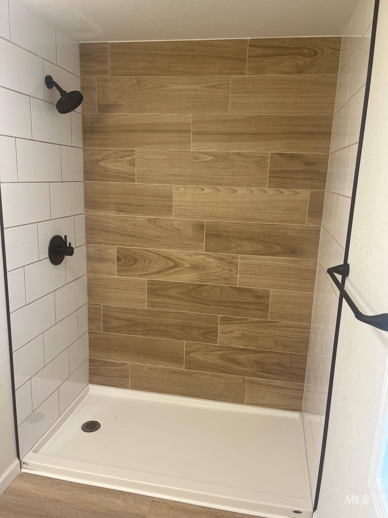 Bathroom featuring a stall shower