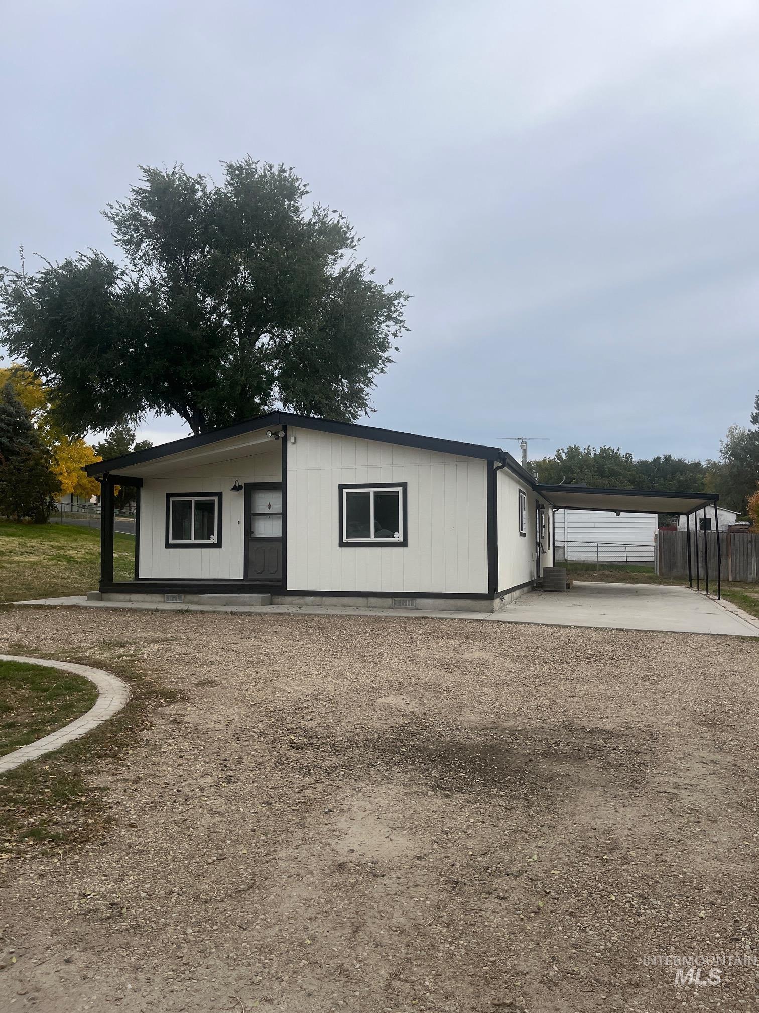 View of front of home featuring driveway