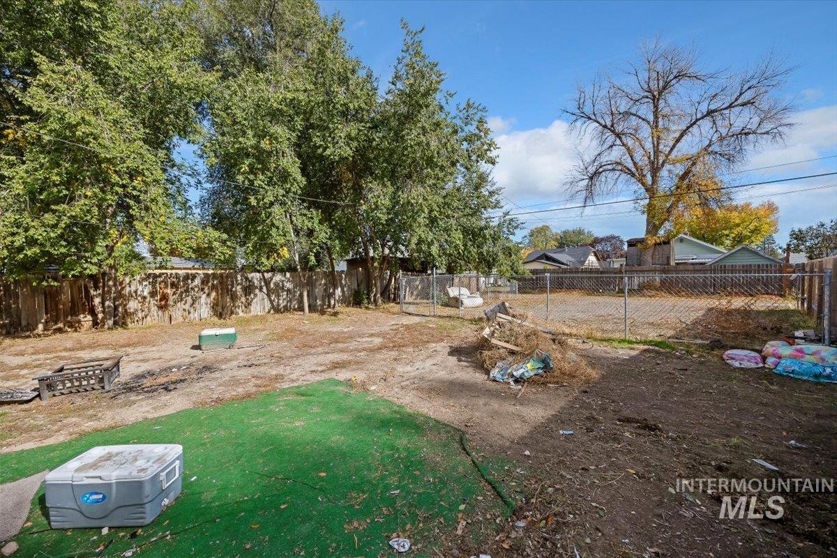 View of fenced backyard