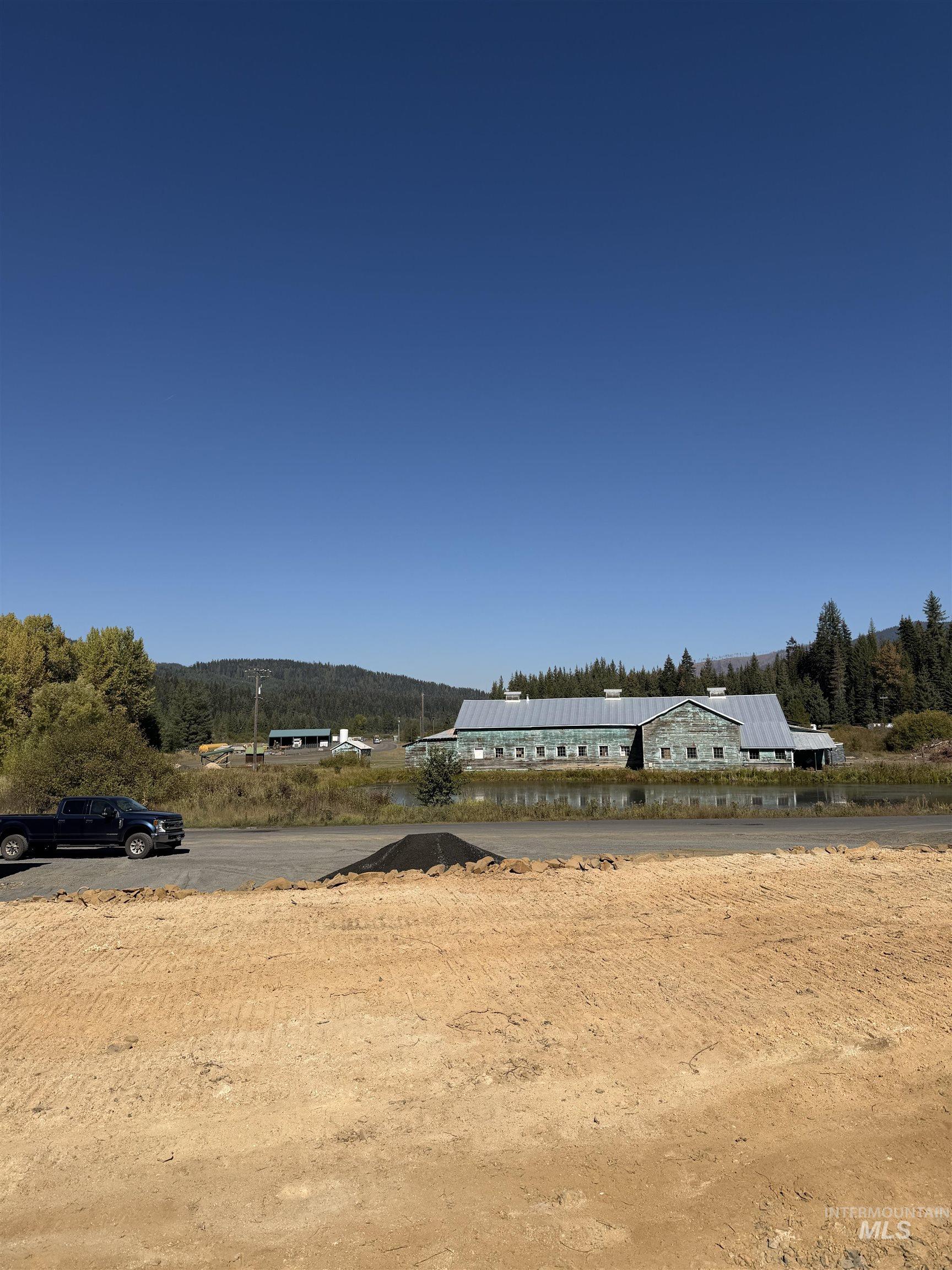 View of yard featuring a wooded view