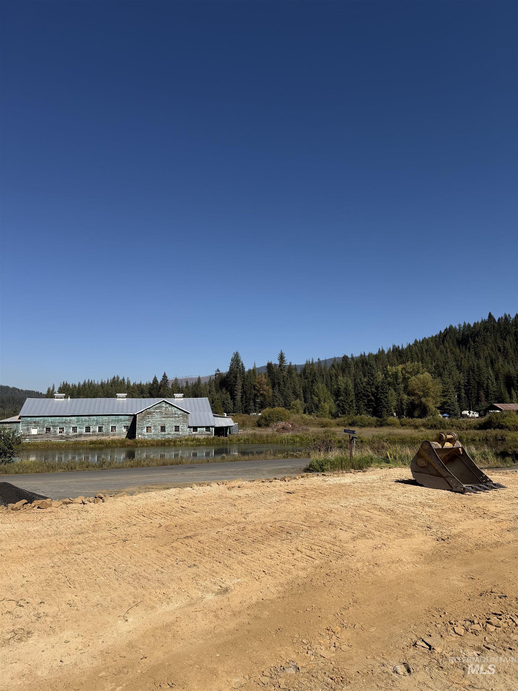 View of yard featuring a forest view