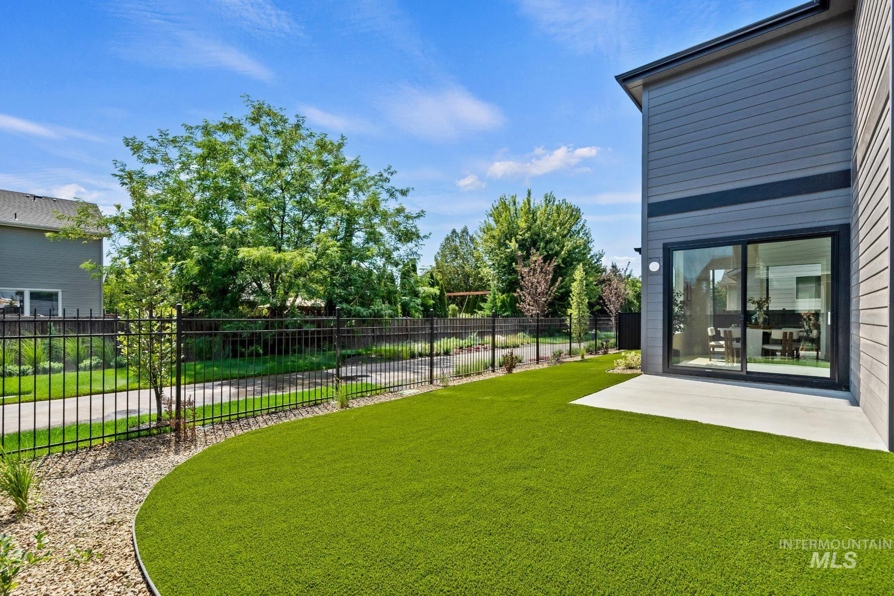 View of yard with a patio