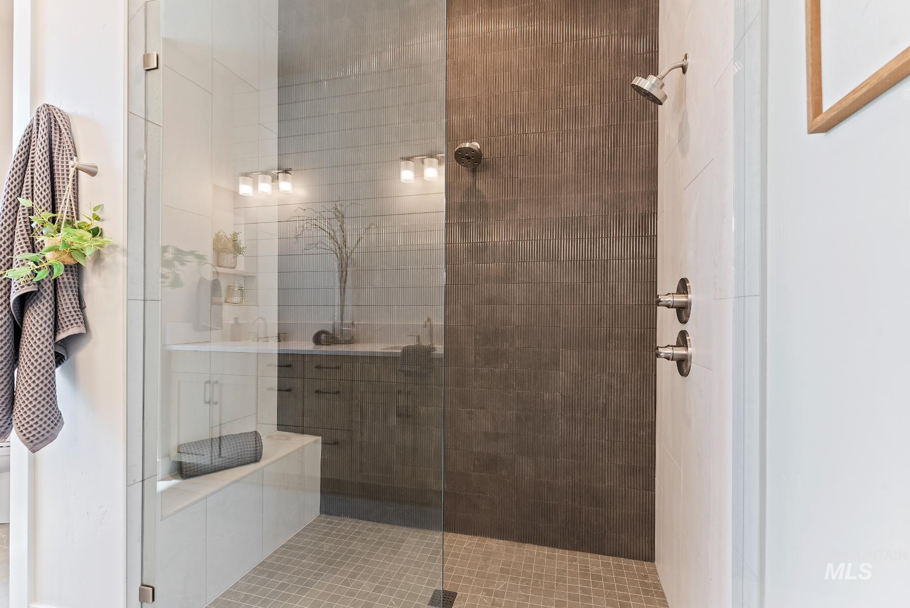Full bathroom featuring a stall shower
