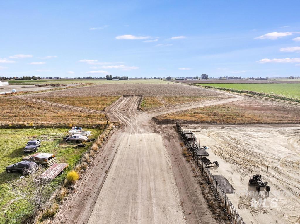 Overview of rural landscape with rows of crops