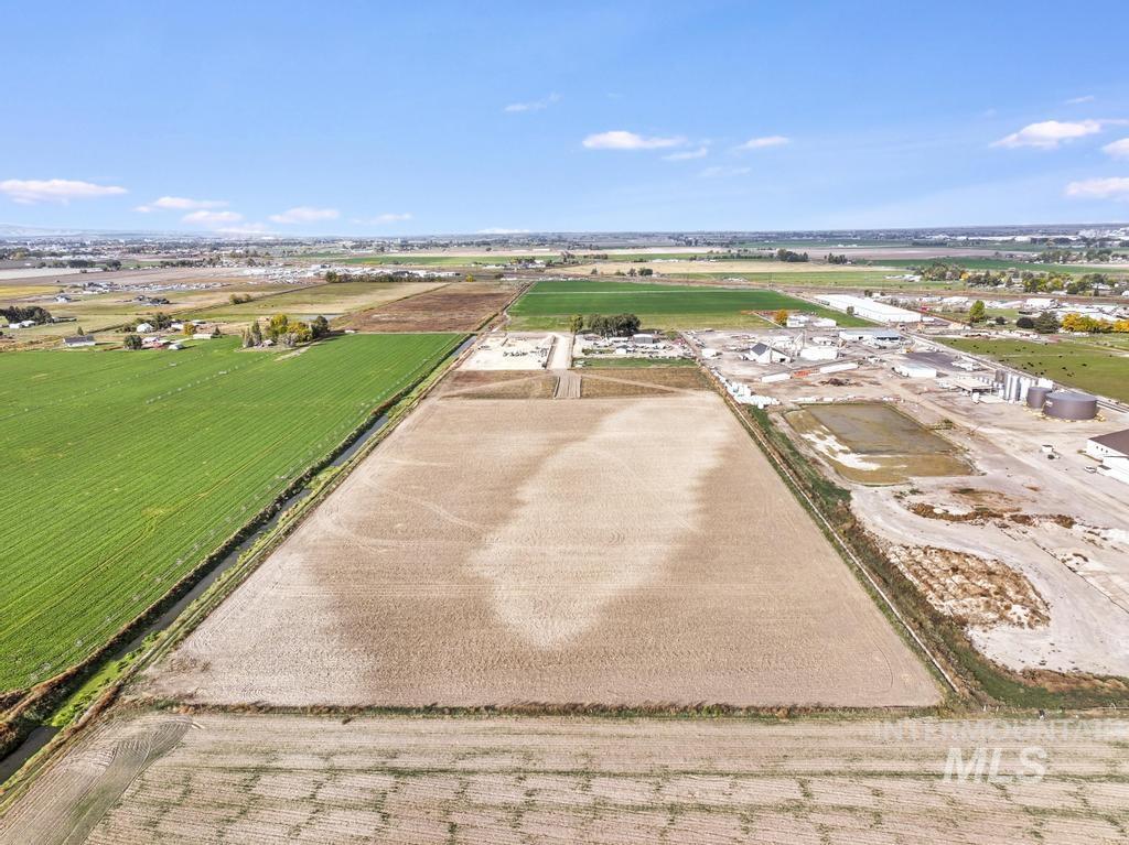 Overview of rural landscape featuring extensive farmland