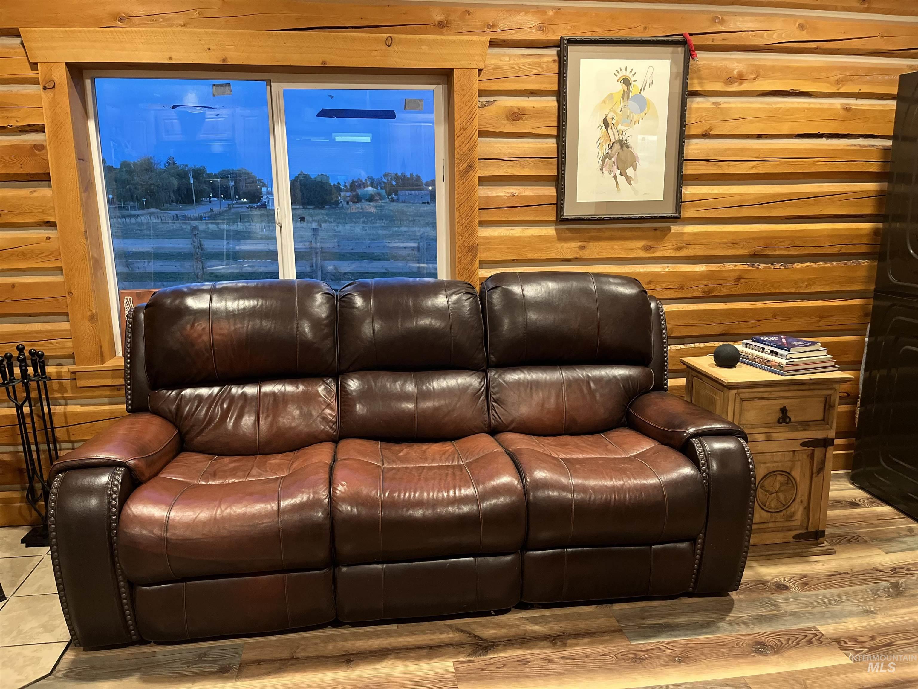 Home theater with wooden walls and rustic walls