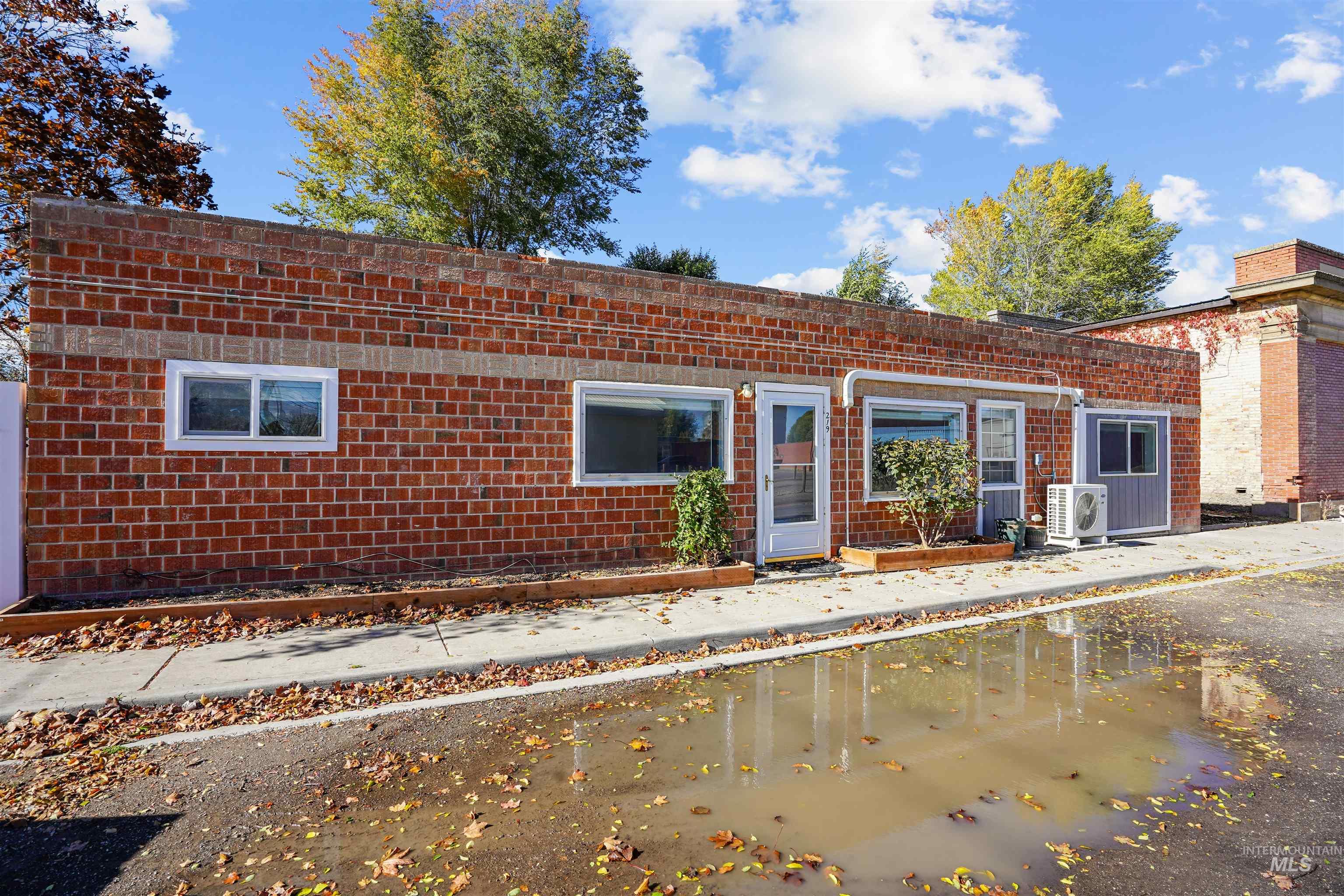 View of front of property featuring a patio