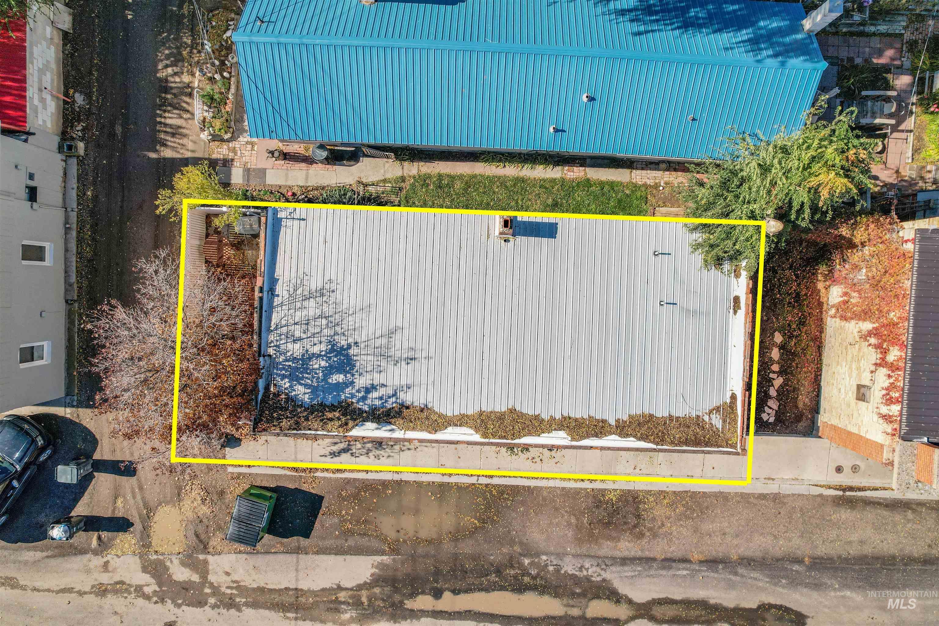 Aerial overview of property's location with property parcel outlined