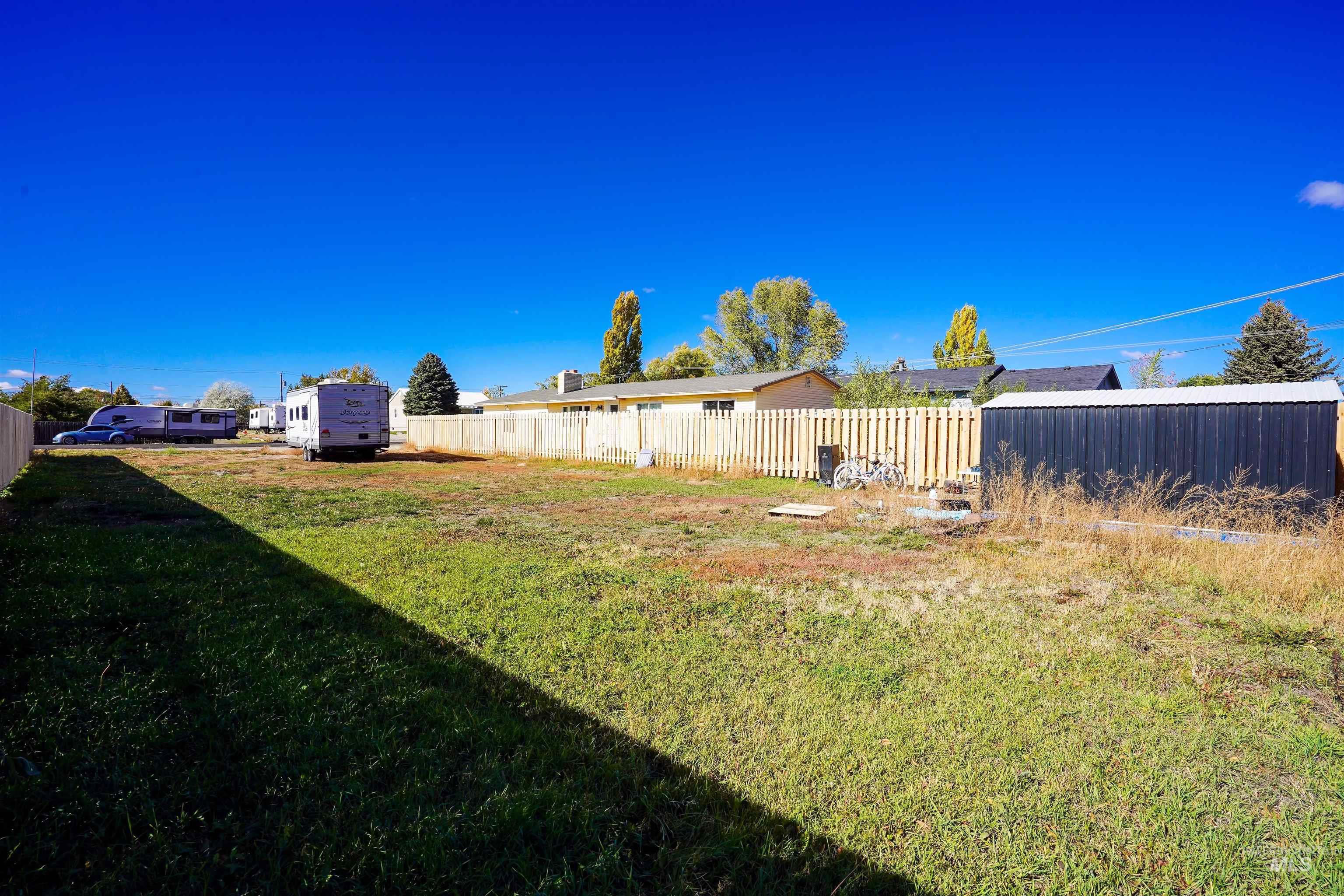 View of fenced backyard