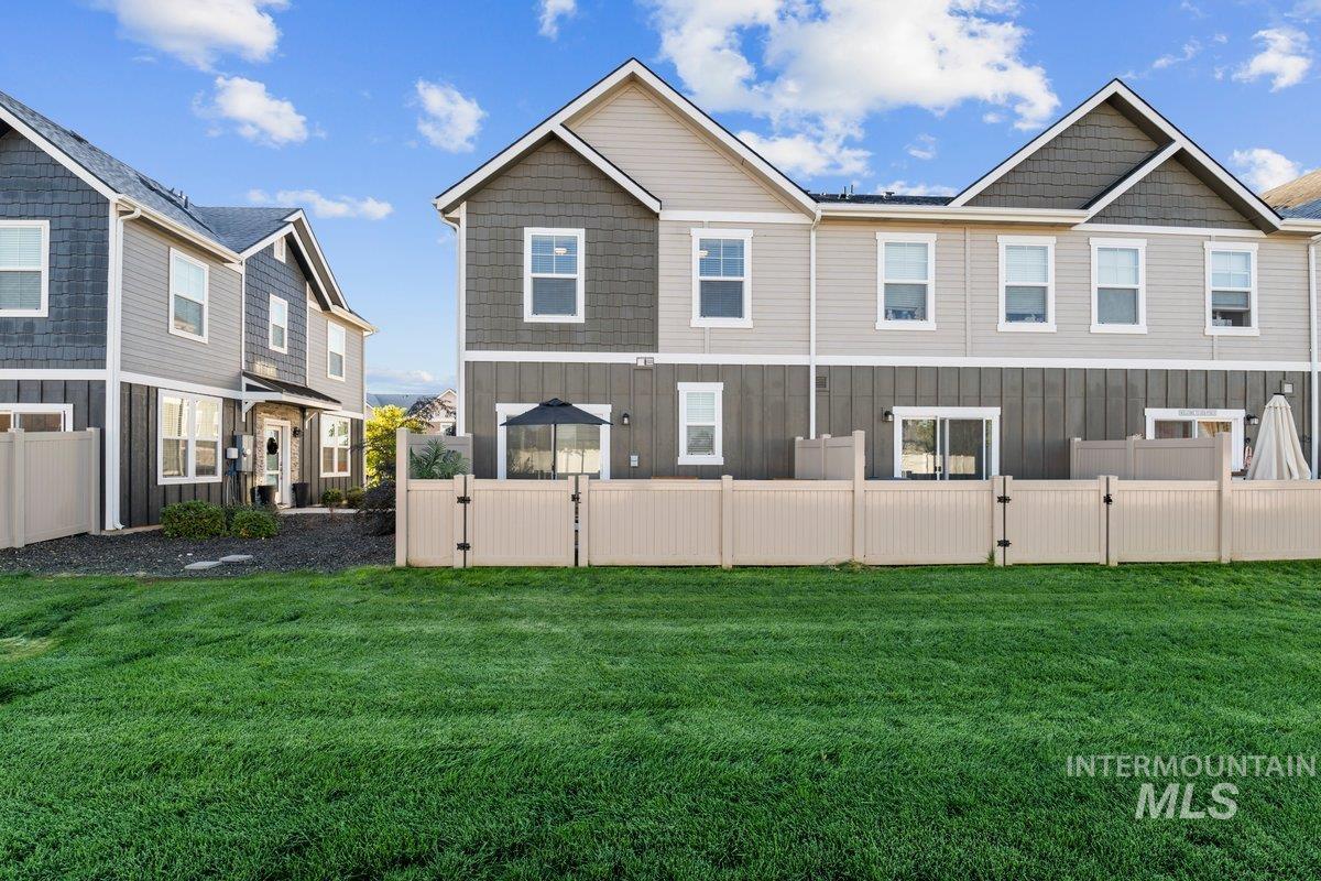 View of fenced backyard