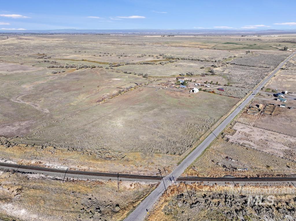 Aerial overview of property's location with rural landscape and a desert landscape