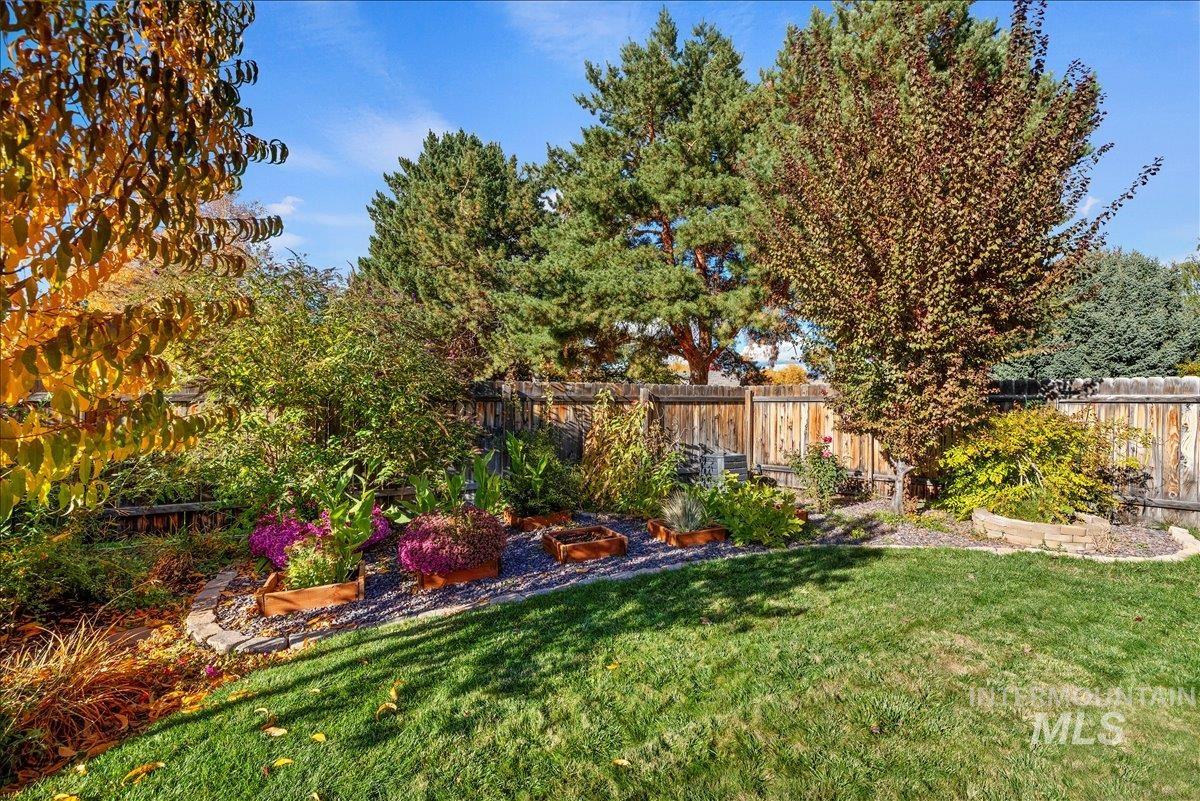 View of fenced backyard