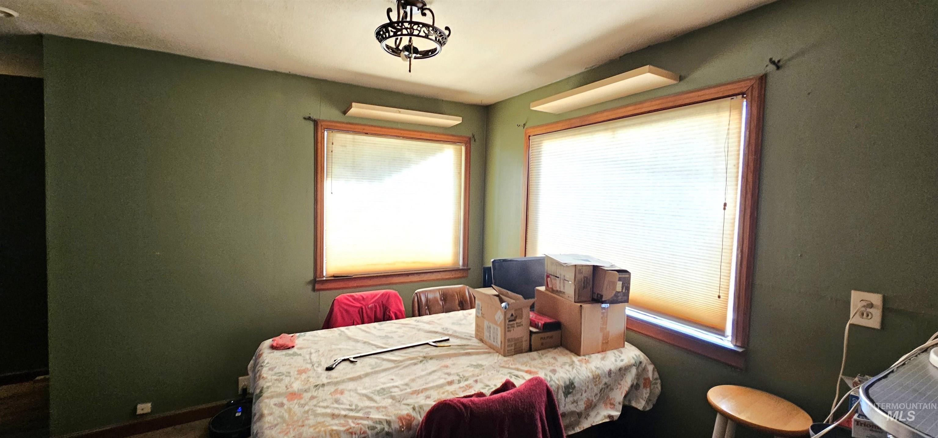 Bedroom featuring baseboards