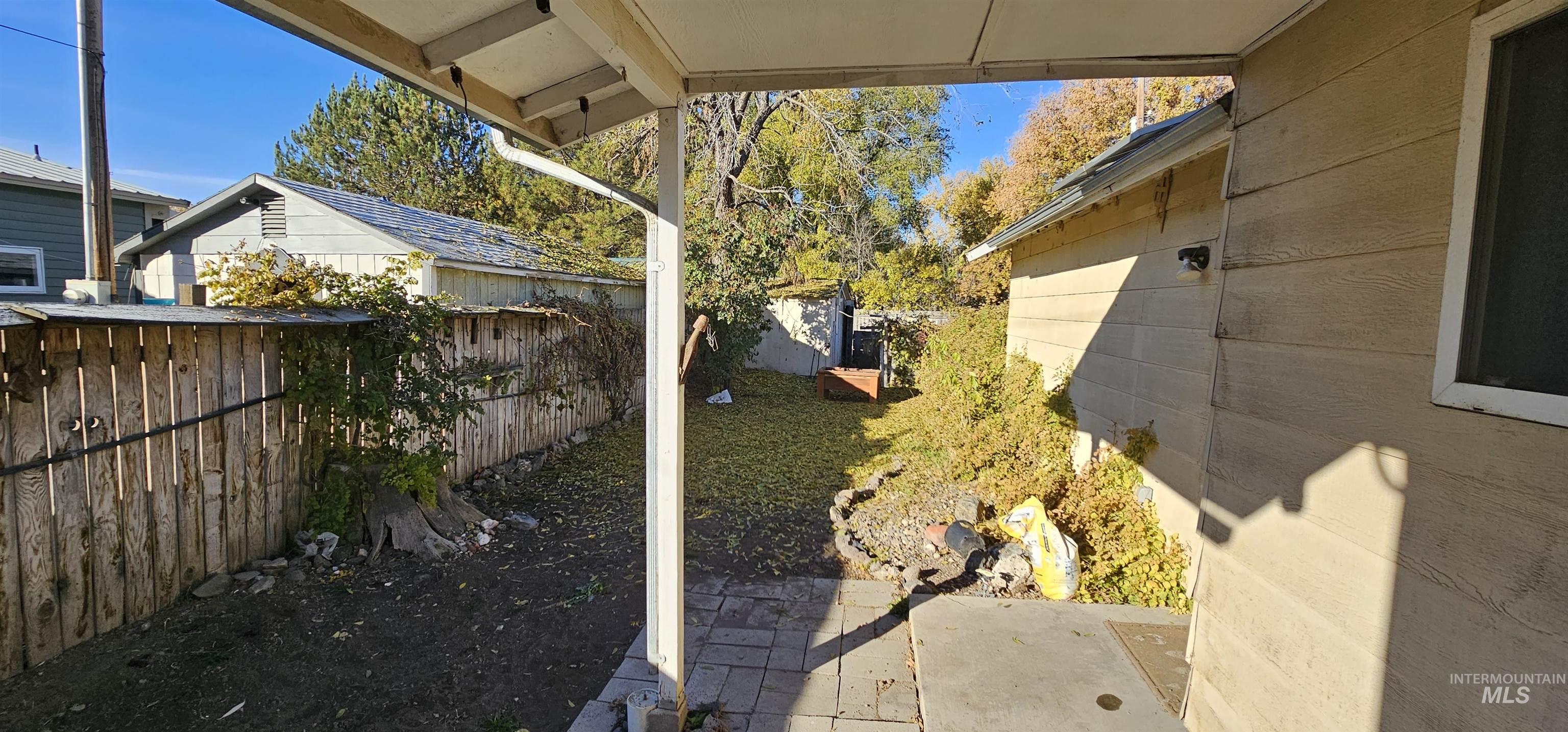View of fenced backyard