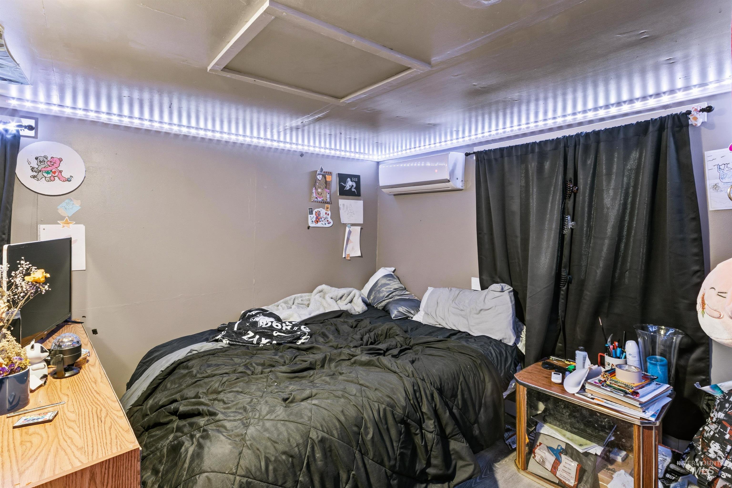 Bedroom featuring attic access