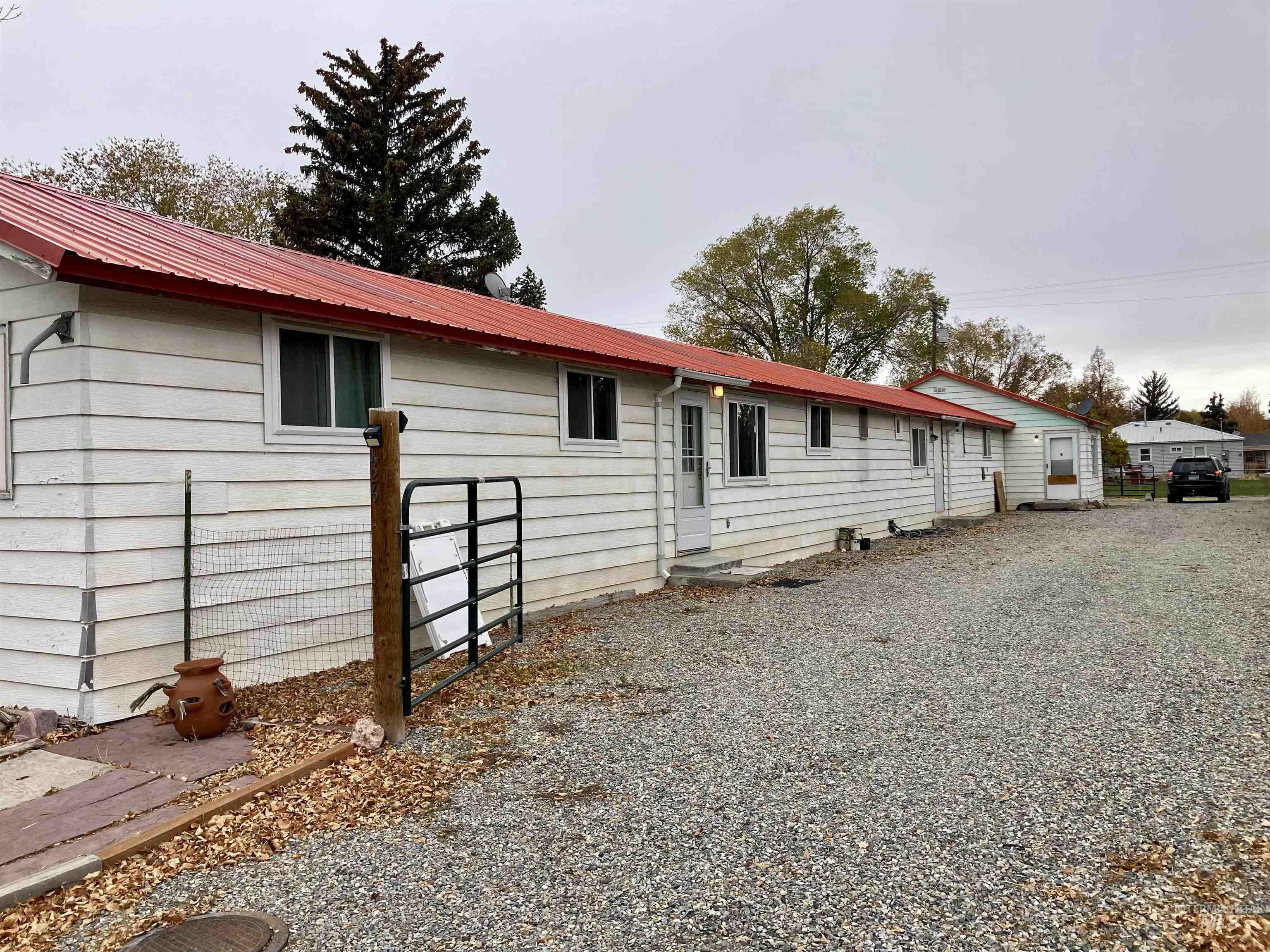 View of front of home featuring a metal roof